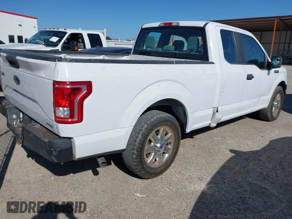 2015 Ford F-150 XL with VIN 1FTEX1C83FKE18476, listed as a IAAI auction lot 41835472 with 243,437 mi miles. Bid and sale history available at carsss.com. Image 4.
