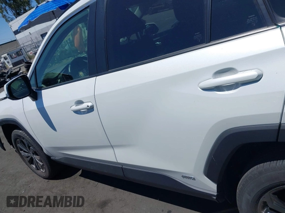 2023 Toyota RAV4 Hybrid XLE Premium with VIN JTMB6RFV0PD087237, listed as a IAAI auction lot 42606802 with 16,872 mi miles and . Bid and sale history available at DreamBid. Image 15.