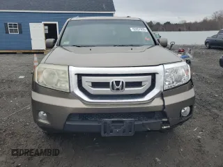 2011 Honda Pilot EX-L with VIN 5FNYF4H64BB022010, listed as a Copart auction lot 52857855 with 169,619 mi miles and Clean Title. Bid and sale history available at carsss.com. Image 5.