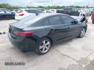 2013 Acura ILX Tech Pkg with VIN 19VDE1F72DE013609, listed as a IAAI auction lot 41984514 with 124,157 mi miles. Bid and sale history available at carsss.com. Image 4.