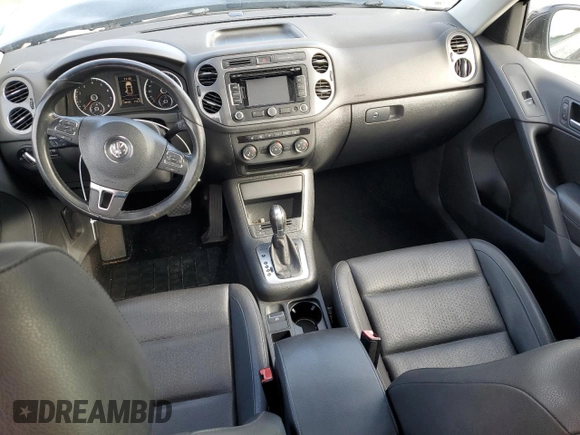2013 Volkswagen Tiguan SE z VIN WVGBV7AXXDW534779, wystawiony jako Copart lot #77397164 z przebiegiem 149 285 mil mil oraz Szkoda całkowita • Salvage title. Historia ofert i sprzedaży dostępna na DreamBid. Obrazek 8.