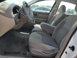 2005 Ford Taurus SE z VIN 1FAHP53U65A184099, wystawiony jako Copart lot #60960015 z przebiegiem Nie podano mil oraz Szkoda całkowita • Salvage title. Historia ofert i sprzedaży dostępna na DreamBid. Obrazek 7.