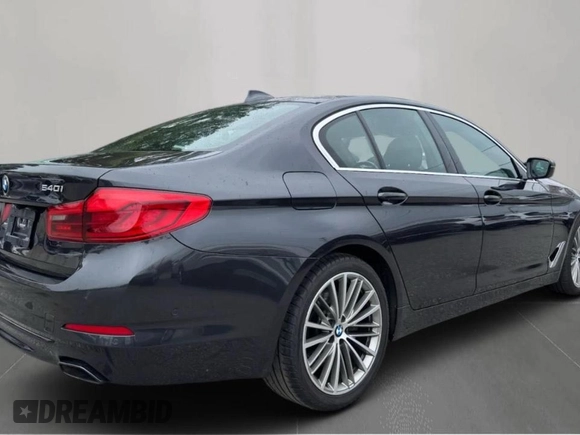 2020 BMW 5 Series with VIN WBAJS1C07LWW6392, listed as a Copart auction lot 63713295 with 126,764 mi miles and Clean title. Bid and sale history available at DreamBid. Image 4.
