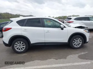 2015 Mazda CX-5 Touring with VIN JM3KE2CY3F0550624, listed as a IAAI auction lot 41931268 with 51,588 mi miles and . Bid and sale history available at carsss.com. Image 13.