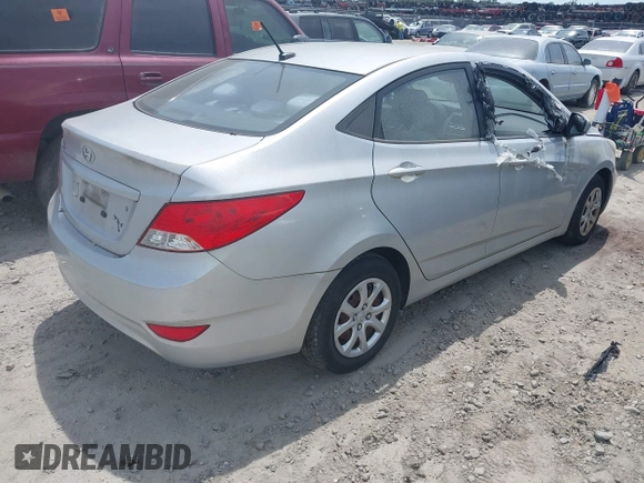 2013 Hyundai Accent GLS with VIN KMHCT4AE3DU403616, listed as a IAAI auction lot 42095208 with 128,523 mi miles. Bid and sale history available at carsss.com. Image 4.
