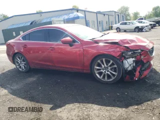 2014 Mazda 6 i Grand Touring with VIN JM1GJ1W57E1104393, listed as a Copart auction lot 55399775 with 187,868 mi miles and Clean Title. Bid and sale history available at DreamBid. Image 4.