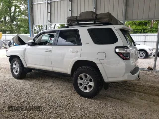 2023 Toyota 4Runner SR5 with VIN JTEMU5JR1P6101521, listed as a Copart auction lot 55879485 with 36,945 mi miles and Salvage title. Bid and sale history available at DreamBid. Image 2.