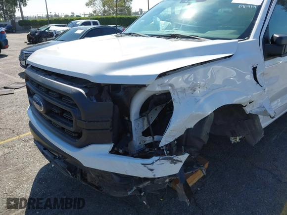 2022 Ford F-150 XL z VIN 1FTEX1CP3NKF26053, wystawiony jako IAAI lot #40372191 z przebiegiem Nie podano mil oraz . Historia ofert i sprzedaży dostępna na DreamBid. Obrazek 16.