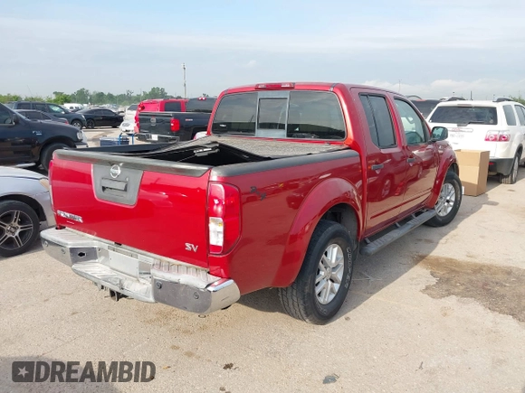 2014 Nissan Frontier SV with VIN 1N6AD0ER0EN749033, listed as a IAAI auction lot 42036166 with 152,276 mi miles and . Bid and sale history available at DreamBid. Image 4.