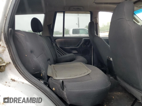 2004 Jeep Grand Cherokee Laredo z VIN 1J4GW48S74C288625, wystawiony jako Copart lot #61290805 z przebiegiem 194 615 mil mil oraz Czysty tytuł • Clean title. Historia ofert i sprzedaży dostępna na DreamBid. Obrazek 11.