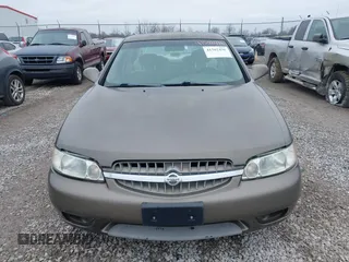 2001 Nissan Altima GXE with VIN 1N4DL01D81C187472, listed as a IAAI auction lot 41502436 with 195,203 mi miles. Bid and sale history available at carsss.com. Image 6.