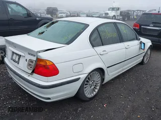 2001 BMW 3 Series 330i with VIN WBAAV53421FJ63150, listed as a IAAI auction lot 41737275 with 999,999 mi miles. Bid and sale history available at carsss.com. Image 4.