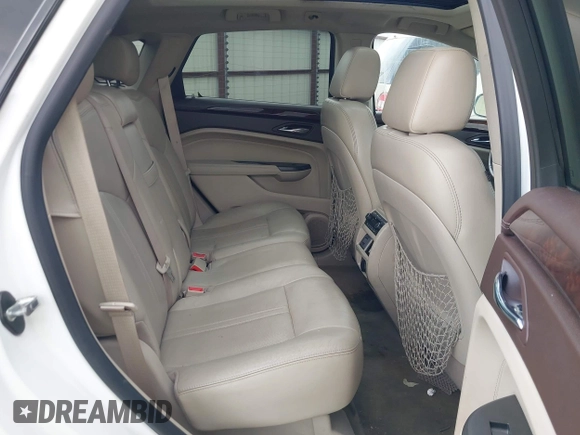 2012 Cadillac SRX Premium Collection with VIN 3GYFNCE38CS517912, listed as a IAAI auction lot 42435672 with 193,103 mi miles and . Bid and sale history available at DreamBid. Image 8.