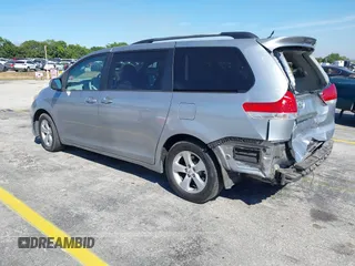 2012 Toyota Sienna LE AAS with VIN 5TDKK3DC6CS189747, listed as a IAAI auction lot 41857367 with 205,376 mi miles and . Bid and sale history available at DreamBid. Image 3.