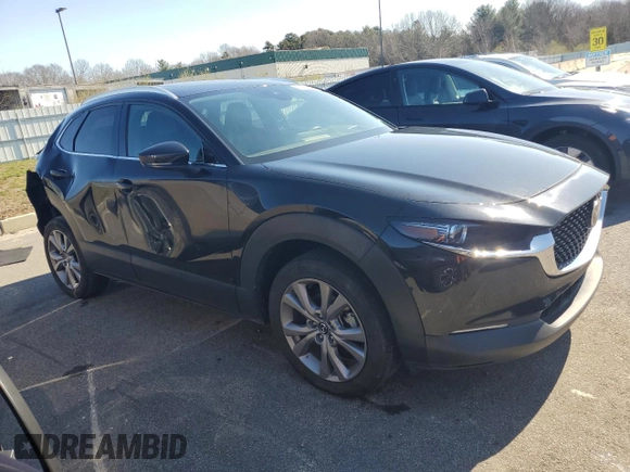 2023 Mazda CX-30 S Premium with VIN 3MVDMBDM6PM571691, listed as a Copart auction lot 53636275 with 38,569 mi miles and Clean Title. Bid and sale history available at DreamBid. Image 4.