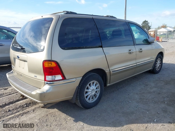 1999 Ford Windstar Wagon SE with VIN 2FMZA5249XBB38156, listed as a IAAI auction lot 42044714 with 199,285 mi miles. Bid and sale history available at carsss.com. Image 4.