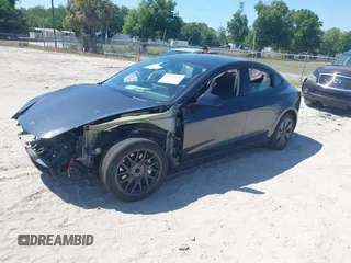 2024 Tesla Model 3 z VIN 5YJ3E1EA6RF747946, wystawiony jako IAAI lot #42042903 z przebiegiem 13 999 mil mil oraz . Historia ofert i sprzedaży dostępna na DreamBid. Obrazek 2.