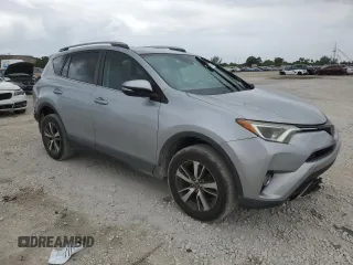 2018 Toyota RAV4 XLE with VIN 2T3WFREV4JW444884, listed as a Copart auction lot 55666275 with 174,275 mi miles and Salvage Title. Bid and sale history available at DreamBid. Image 4.