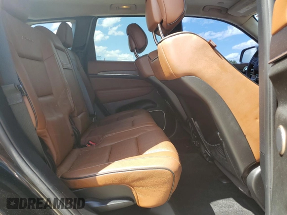 2015 Jeep Grand Cherokee Summit with VIN 1C4RJFJG6FC828922, listed as a Copart auction lot 54878415 with 125,781 mi miles and Salvage title. Bid and sale history available at DreamBid. Image 10.