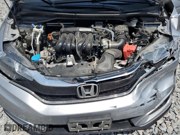 2018 Honda Fit Sport z VIN 3HGGK5H68JM736263, wystawiony jako Copart lot #57206675 z przebiegiem 25 494 mil mil oraz Szkoda całkowita • Salvage title. Historia ofert i sprzedaży dostępna na DreamBid. Obrazek 11.