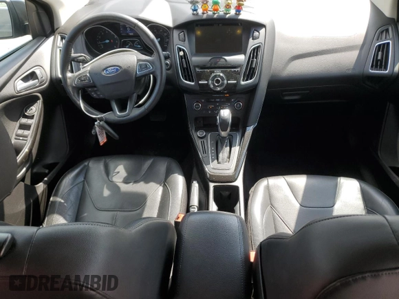 2016 Ford Focus Titanium with VIN 1FADP3N27GL201482, listed as a Copart auction lot 51768335 with 54,463 mi miles and Salvage title. Bid and sale history available at DreamBid. Image 8.