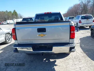 2018 Chevrolet Silverado 1500 LT with VIN 1GCVKREH4JZ323242, listed as a IAAI auction lot 41971945 with 63,915 mi miles and . Bid and sale history available at DreamBid. Image 16.