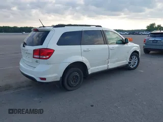 2018 Dodge Journey SXT with VIN 3C4PDCBG4JT369687, listed as a IAAI auction lot 42269696 with 131,306 mi miles and . Bid and sale history available at DreamBid. Image 4.