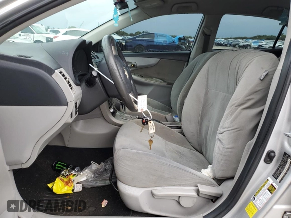 2012 Toyota Corolla L with VIN 2T1BU4EE4CC819483, listed as a Copart auction lot 49009845 with 219,646 mi miles and Non Repairable. Bid and sale history available at carsss.com. Image 7.