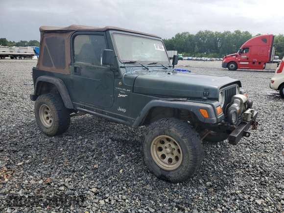 1998 Jeep Wrangler Sport with VIN 1J4FY19S5WP795781, listed as a Copart auction lot 59718065 with 208,416 mi miles and Salvage title. Bid and sale history available at DreamBid. Image 4.