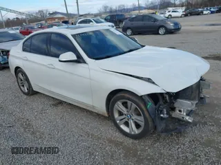 2018 BMW 3 Series 330i xDrive with VIN WBA8D9G52JNU68682, listed as a IAAI auction lot 41421618 with 117,301 mi miles. Bid and sale history available at carsss.com. Image 1.