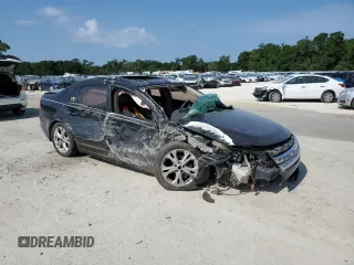 2012 Ford Fusion SE with VIN 3FAHP0HA3CR167698, listed as a Copart auction lot 55909695 with 128,025 mi miles and Salvage title. Bid and sale history available at DreamBid. Image 4.