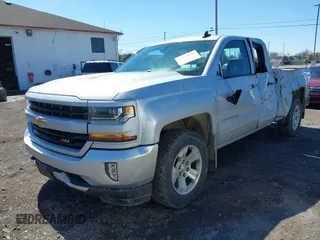 2018 Chevrolet Silverado 1500 LT with VIN 1GCVKREC8JZ237565, listed as a IAAI auction lot 42052619 with 92,790 mi miles and . Bid and sale history available at DreamBid. Image 2.