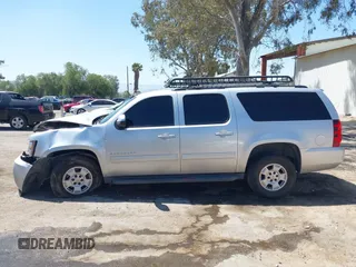 2013 Chevrolet Suburban LT with VIN 1GNSCJE06DR138925, listed as a IAAI auction lot 42008011 with 236,244 mi miles. Bid and sale history available at carsss.com. Image 14.