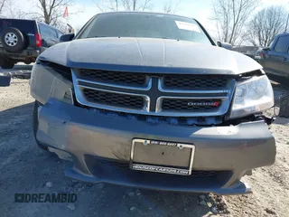 2013 Dodge Avenger SE with VIN 1C3CDZAB8DN596915, listed as a IAAI auction lot 41781939 with 122,440 mi miles and . Bid and sale history available at carsss.com. Image 6.