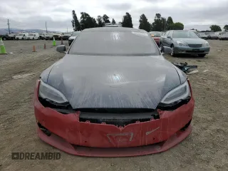 2016 Tesla Model S 90D z VIN 5YJSA1E41GF171522, wystawiony jako Copart lot #59966545 z przebiegiem Nie podano mil oraz Szkoda całkowita • Salvage title. Historia ofert i sprzedaży dostępna na DreamBid. Obrazek 5.