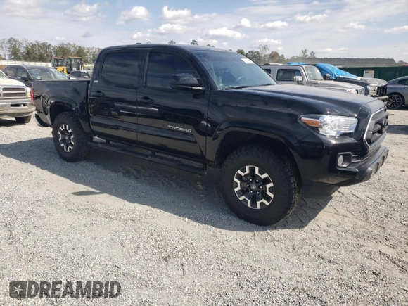 2023 Toyota Tacoma SR with VIN 3TYAX5GN2PT068021, listed as a Copart auction lot 76362104 with 41,757 mi miles and Salvage title. Bid and sale history available at DreamBid. Image 4.