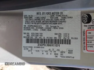 2010 Ford Fusion Hybrid z VIN 3FADP0L38AR411074, wystawiony jako IAAI lot #41928348 z przebiegiem 79 306 mil mil oraz . Historia ofert i sprzedaży dostępna na DreamBid. Obrazek 9.