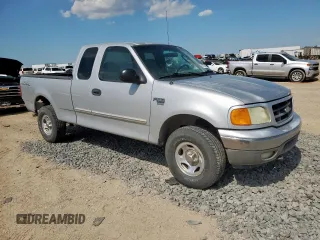 2004 Ford F-150 XL with VIN 2FTRX18WX4CA54373, listed as a Copart auction lot 63733095 with Not provided miles and Salvage title. Bid and sale history available at DreamBid. Image 4.