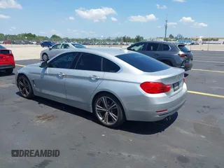 2016 BMW 4 Series 428i with VIN WBA4A9C54GG506519, listed as a IAAI auction lot 42288722 with 116,863 mi miles and . Bid and sale history available at DreamBid. Image 3.