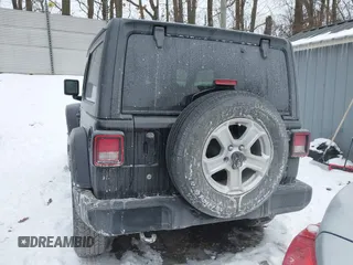 2020 Jeep Wrangler Willys z VIN 1C4GJXAG1LW118348, wystawiony jako IAAI lot #41404125 z przebiegiem 35 325 mil mil oraz . Historia ofert i sprzedaży dostępna na DreamBid. Obrazek 17.