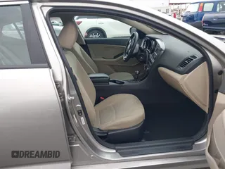 2015 Kia Optima LX with VIN KNAGM4A78F5584534, listed as a IAAI auction lot 42182927 with 63,225 mi miles and . Bid and sale history available at carsss.com. Image 5.