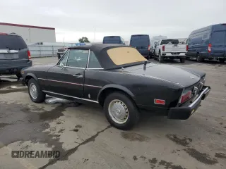 1975 FIAT 124 Spider z VIN 124CS10095845, wystawiony jako Copart lot #86344634 z przebiegiem 86 863 mil mil oraz Czysty tytuł • Clean title. Historia ofert i sprzedaży dostępna na DreamBid. Obrazek 2.