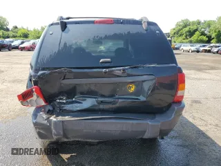 2004 Jeep Grand Cherokee Laredo z VIN 1J4GW48S24C217901, wystawiony jako Copart lot #60436675 z przebiegiem 263 837 mil mil oraz Szkoda całkowita • Salvage title. Historia ofert i sprzedaży dostępna na DreamBid. Obrazek 6.