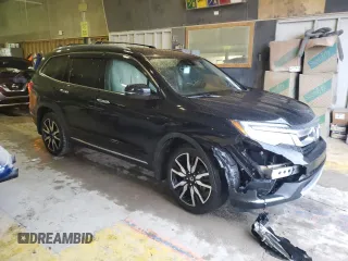 2020 Honda Pilot Touring 8-Passenger with VIN 5FNYF6H90LB043055, listed as a Copart auction lot 85194544 with 82,144 mi miles and Salvage Title. Bid and sale history available at DreamBid. Image 4.