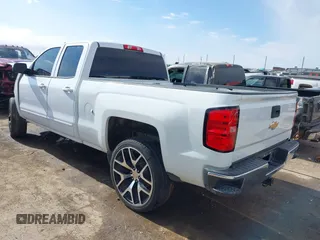 2018 Chevrolet Silverado 1500 LT with VIN 1GCRCREC2JZ361099, listed as a IAAI auction lot 41306266 with 121,924 mi miles and . Bid and sale history available at DreamBid. Image 3.