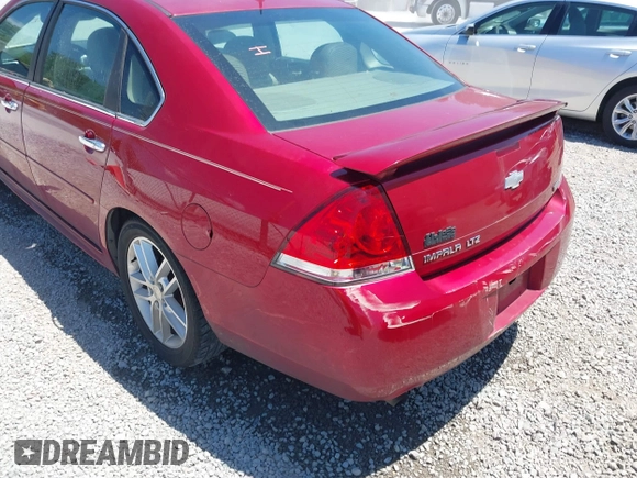 2013 Chevrolet Impala LTZ with VIN 2G1WC5E35D1175879, listed as a IAAI auction lot 42143602 with 156,385 mi miles and . Bid and sale history available at DreamBid. Image 6.