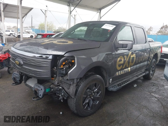 2022 Ford F-150 Lightning Pro z VIN 1FTVW1EL8NWG14070, wystawiony jako IAAI lot #41776980 z przebiegiem 14 812 mil mil oraz . Historia ofert i sprzedaży dostępna na DreamBid. Obrazek 22.