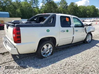 2010 Chevrolet Avalanche LTZ with VIN 3GNVKGE09AG250035, listed as a Copart auction lot 58019804 with 193,509 mi miles and Salvage Title. Bid and sale history available at carsss.com. Image 3.
