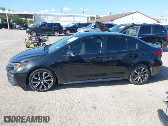 2021 Toyota Corolla SE with VIN JTDS4MCE5MJ056494, listed as a IAAI auction lot 41936866 with 128,257 mi miles. Bid and sale history available at carsss.com. Image 14.