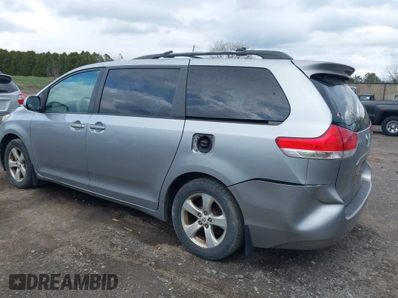 2011 Toyota Sienna LE AAS with VIN 5TDKK3DC8BS051934, listed as a IAAI auction lot 42040204 with 207,863 mi miles. Bid and sale history available at carsss.com. Image 3.